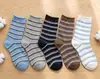 Calcetines nuevos de media pantorrilla para mujer de primavera y verano, calcetines de moda estilo ins, calcetines largos de cuadros británicos y rayas coloridas, transpirables y absorbentes del sudor