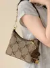 Bolso de Axila Bolso de Mujer 2026 Nuevo Bolso Casual de Hombro Único Textura de Alta Gama Lujo Ligero Moda Retro Bolso de Hombro Cruzado Único