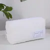 Bolsa de maquillaje estilo coreano nueva de gran capacidad, bolsa de almacenamiento acolchada de algodón con forma de corazón, linda bolsa de aseo portátil, bolso de mano de compras