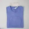 Ropa nueva de yoga alta elasticidad sin costuras ajustada para mujer camiseta deportiva de manga corta transpirable de punto alta elasticidad fitness camiseta corta