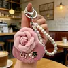 Llavero Creativo de Camelia Corazón con Colgante de Espejo de Maquillaje Plegable Incrustado de Diamantes, Accesorio de Bolso de Moda de Lujo Ligero, Pequeño Regalo