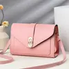 Bolsa de Ombro Simples Cor Sólida com Fivela de Travamento 2025 Nova Bolsa de Mão Transversal Feminina Porta-Moedas de Couro para Celular Cor em Bloco