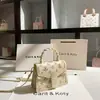 Moda Dropshipping Bolso Tejido de Nicho de Moda 2026 Primavera Bolso Cuadrado Pequeño en Relieve de Gama Alta al por Mayor