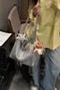 Bolso tote tejido de un solo hombro para mujer, nuevo modelo 2026, bolso tipo cubo de gran capacidad, bolso tejido versátil de cuero de superfibra