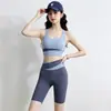 Conjunto de yoga bicolor de cintura cruzada para mujer, conjunto de dos piezas de top deportivo y shorts de cintura alta, ropa de fitness Pilates adelgazante