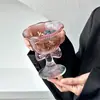 Taza alta con lazo rosa, copa de vino tinto de alto valor, copa de champán, copa de cóctel, taza de café