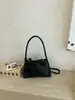 Bolso de Hombro Cruzado Casual de Alto Valor con Patrón Tejido Retro de Nicho Transfronterizo para Mujer 2026 Nueva Moda
