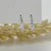 Pendientes de Botón de Circonita de Seis Garras de Marca de Moda Aguja de Plata S925 Moda Simple Versátil Lujo Ligero Brillante Pendiente de Diamante Blanco Joyería al por Mayor