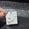 Nuevo Conjunto de Aretes de Múltiples Piezas, Aretes de Mariposa, Circonita Súper Brillante, Galvanizado Ecológico, Aguja de Plata S925, Moda de Invierno