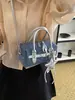 Bolso de Bowling de Diseño de Nicho de Moda de Este Año, Bolso Cruzado de Mano, Bolso de Hombro Versátil Nuevo 2026