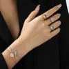TEMU Mais Vendido Colar em Camadas Sol e Lua Entrelaçados Feminino Personalidade Europeia Americana Design de Sol e Lua Cravejado com Strass Joia de Mão para Casal