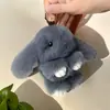 Venta al por mayor de fábrica imitación de pelo de conejo rex colgante de conejo de peluche fingiendo estar muerto lindo conejo MengMeng bolso de peluche accesorios para teléfono móvil coche llavero