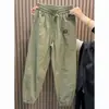 Pantalones casuales para hombre para exportación, estilo recto holgado, pantalones jogger de moda para hombre 2026, versátiles y elegantes, inspirados en Hong Kong