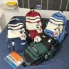 Mochila de grande capacidade, leve e adequada para homens e mulheres, ideal para alunos do ensino fundamental II e médio, perfeita para a escola e uso casual, e disponível para vendas transfronteiriças