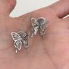 Aretes de borla de mariposa colgante súper hada largos elegantes clip para la oreja de viento frío transparente lujo ligero Alto sentido nuevos aretes para mujer