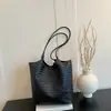 Bolsa grande de textura tecida para mulheres, novidade outono 2026, sensação solta, bolsa tote fashion, cor sólida, bolsa de ombro única estilosa
