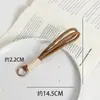 Llavero Colgante de Cuerda Tejida a Mano Dopamina Colores Variados Encanto Corto para Bolso de Teléfono Estilo Ins Accesorios Decorativos