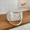 Bolsa de Ombro Feminina 2026 Bordada Tendência Lantejoula Grande Capacidade Nova Simples Moda Texturizada Corrente Commuter Sob o Braço para Mulheres