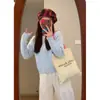 Cárdigan de Punto Azul de Manga Larga de un Solo Botón para Mujer Otoño Invierno 2026 Nuevo Cuello Redondo Estilo Relajado Suéter Abrigo Suave y Esponjoso