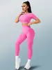 Conjunto de yoga sexy de venta caliente transfronterizo para primavera y verano, ropa de yoga para entrenamiento físico, leggings deportivos sin costuras de melocotón para mujer