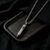 Collar exclusivo de acero inoxidable transfronterizo con cabeza de bala simulada, collar de hip-hop para hombre, accesorio versátil punk para pareja al por mayor