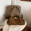 Bolso de hombro elegante Ladepao para mujer, un nuevo bolso cruzado de lujo ligero con un diseño texturizado, perfecto para ir al trabajo, 2026 gamuza retro belleza versátil