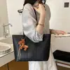 Bolso grande de capacidad simple para mujer, nuevo modelo de verano 2026, adecuado para el trabajo diario y los desplazamientos, bolso de hombro casual, bolso tote para mujer