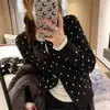 Cárdigan de punto gris con lunares estilo coreano para mujer, nuevo modelo otoño 2026, diseño en capas, nicho, adelgazante, top de manga larga