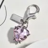 Nuevo Colgante Metálico Rosa Plateado Forma de Corazón Botella de Perfume de Cereza Llavero Accesorio Versátil para Bolsa Venta al por Mayor Dropshipping