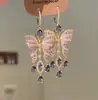 Pendientes de Borla Mariposa con Diamantes Morados Microincrustados Estilo Palacio Retro Lujo Accesible Exquisitos Pendientes de Oro Flash Industria Pesada para Mujer