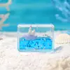 Adorno de escritorio popular de TikTok con temática oceánica e infusión de aceite para aliviar el estrés, regalo cultural y creativo, botella de arena líquida a la deriva al por mayor
