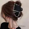 Presilha de Cabelo Triângulo Preto para Mulheres 2026 Novo Estilo Grampo de Cabelo de Alta Qualidade para Penteado no Topo da Cabeça Presilha Tubarão Acessório de Cabelo
