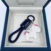 Fique Rico Imediatamente Pingente de Chaveiro de Couro de Vaca Feito à Mão para Carro Lanyard Elegante Simples Exquisito para Casais Masculinos e Femininos