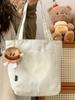Bolsa de Lona Simples Casual Estilo Japonês Ins para Mulheres Outono 2025 Bolsa Tote de Grande Capacidade Bolsa de Ombro Estudante para Deslocamento