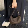 Bolso pequeño tejido de alta gama para mujer, nuevo bolso cruzado versátil 2026, casual, simple, moderno y elegante, tipo bolsa de dumpling