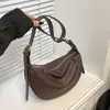 2026 Bolso tipo bolsa de dumplings de alta gama nuevo para mujer, Bolso cruzado versátil, Bolso de hombro de moda para ir al trabajo, Diseño de nicho, Material de cuero