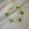 Pulsera de Trébol de Cuatro Hojas de la Suerte Transfronteriza Oro de 18 Quilates Doble Cara Nácar Moda Europea y Americana Versátil Nuevo Modelo Popular