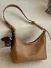 Bolsa de Ombro Cruzada Feminina Estilo Retro Simples para o Dia a Dia Outono 2026 Novo Estilo Personalidade Grande Capacidade Casual
