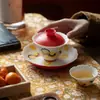 Colección de juego de té de cerámica pintado a mano con engobe: gaiwan, tetera, taza de maestro, taza de degustación, soporte para tetera, taza de café