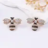 Pendientes de aleación con diseño simple de lujo ligero, moda exquisita transfronteriza, pendientes de abeja de insecto totalmente engastados con diamantes, pendientes diarios versátiles para mujer