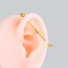 Varilla de Acero Inoxidable de 1.2MM Flor de Margarita Alas de Amor Moda Personalidad Puente de Oreja Europeo y Americano Aretes de Perforación para Cartílago