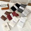 Calcetines de canalé a rayas rojas de angora para mujer, otoño e invierno, color liso, sencillos, versátiles, estilo japonés, calcetines largos de algodón