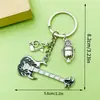 Venta Caliente Transfronteriza Cinta de Música Antigua Saxofón Órgano Llavero Diseño Creativo Sentido Colgante de Bolsa Pequeños Accesorios
