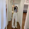 Calça jeans larga off-white para mulheres, estilo coreano, cintura alta, versátil, afina a silhueta, solta, corte reto, com caimento, pantalona para estudantes