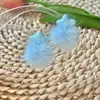 Pendientes Navideños de Peluche Estrella Peluda 2025 Nuevos Pendientes de Alta Gama Pendientes de Bola de Pelo Femeninos Otoño e Invierno