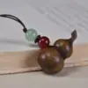 Artesanato de cabaça pequena esculpida em sândalo vermelho e sândalo verde, pingente pequeno para pendurar, chaveiro de cabaça lisa, celular, decoração de casa, versátil