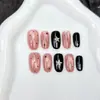 Arte de uñas con estampado de estrellas rosa y negro con efecto ojo de gato de cristal brillante, lindo diseño de lunares negros y rosas, estilo corto, hace que la piel luzca más clara, adecuado para el trabajo y el uso diario, arte de uñas al por mayor