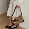 Bolso de hombro de moda estilo vintage, bolso de axila para mujer, bolso cruzado simple versátil nuevo de gamuza