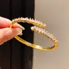 Pulsera Ajustable de Zirconia con Forma de Gota de Agua Chapada en Oro Real de 18 Quilates Moda Transfronteriza Pulsera Sencilla Lujo Ligero Sensación de Alta Gama Joyería de Mano para Mujer