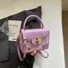 Bolso pequeño rosa a cuadros súper popular para mujer, nuevo bolso cruzado versátil de moda 2026, bolso cuadrado pequeño informal tipo caja estilo coreano